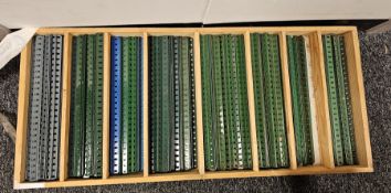Two trays of Meccano girders of various lengths and colours to include silver, blue, brown, etc