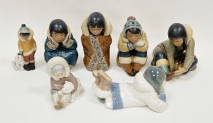 Collection of Lladro figures of Inuit children, four of large size in matt glazes, one similar