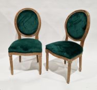 Pair of limed oak side chairs in the Louis XVI manner, with oval backs and green fabric