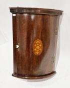 Mahogany hanging bowfront corner cabinet in the Regency manner, with dentil moulded cornice, the