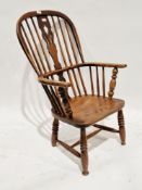 19th century windsor ash and elm elbow chair, the hoop and stick back with central carved pierced