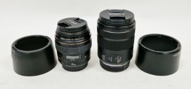 Two Canon camera lenses - EF 85mm 1:1.8 with ET-65III hood and RF85mm F2 macro IS STM with JJC LH-