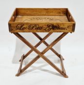 Reproduction wooden French patisserie tray of rectangular form with pierced handles, on a folding