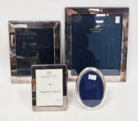 Three ' Walter Bull & Son of Cirencester ' silver plated rectangular photograph frames, largest
