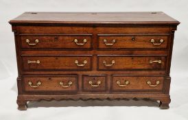 18th/early 19th century oak and walnut cross-banded mule chest, the hinged top with ogee moulded