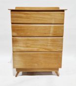 Mid century blonde chest of four long graduated drawers in the manner of Russell Wright stardust