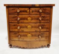 Victorian mahogany and flamed mahogany bow fronted chest of drawers, the two short and three long