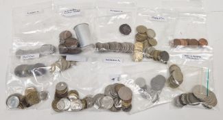 Collection of coins including French francs, Indonesian, Sri Lankan / Ceylon, Malaysian, American,