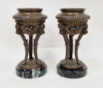 Pair of French 19th century style bronzed cast metal marble mounted cassolettes, 20th century,