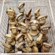 Twenty brass bell weights with loop handles, all imperial, ranging from 7lb to 2lb