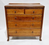 Early 20th century oak chest, the top with moulded upstand and edge, over two short and three long