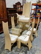 Modern rattan dining room suite by Trumps of Guildford, comprising a Bella glass-topped dining table