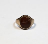 Antique yellow metal signet ring set with an oval carnelian (a/f)