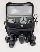 Pentax K10D SLR camera, a Lumix 20/1200 camera, a Pentax 12-24 lens, a Sony Cyber-Shot digital