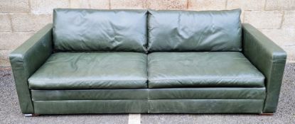 Heals of London green leather upholstered four-seater sofa with square back and arms, having two