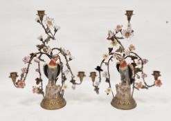 Pair of 20th century gilt-metal and Continental porcelain mounted three-light candelabra, iron-red