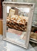 Revived Georgian-style carved silvered wood wall mirror, rectangular with bevel edged plate, all