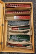 Two boxes of various Meccano pieces to include strips, girders, double braced girders, wheels,