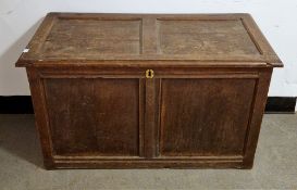 19th century two-panel oak coffer (lacking front feet), 59cm high x 96cm wide x 48cm deep