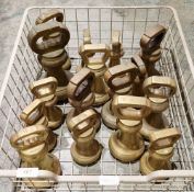 Collection of sixteen brass bell weights with loop handles, all imperial ranging from 14lb (22cm
