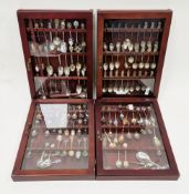 Four souvenir teaspoon display cabinets, each with single glazed door, 42cm wide containing a