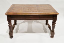 Early 20th century oak table, the rectangular top with raised central panel and canted corners,