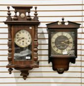 19th century walnut cased hanging wall clock, the column and finial pediment with eagle cresting,
