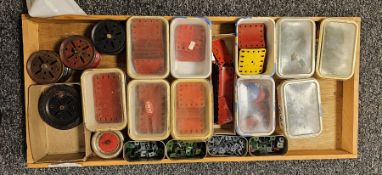 Two trays of various Meccano pieces to include, strips, curved strips, girders, wheels, etc of