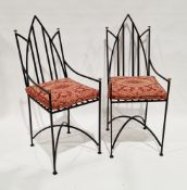 Pair of Gothic-style wrought iron garden/conservatory chairs with brass knob finials and loose