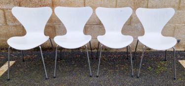 Set of four Fritz Hansen, 105 white painted plywood stacking chairs, designed by Arne Jacobsen, 79cm