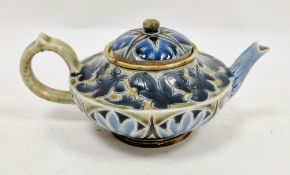Royal Doulton stoneware teapot and cover, late 19th century, by Emily E Stormer, impressed and