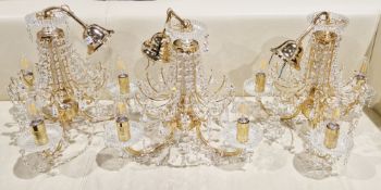 Three matching Italian gilt metal three-branch chandeliers, each set with strings of Swarovski