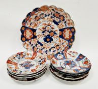 Group of Japanese imari fluted circular dishes, late 19th century, comprising one large example