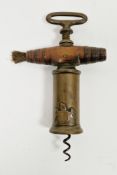 19th century Thomason III variant patent NE plus ultra corkscrew with a brass ring handle, wooden