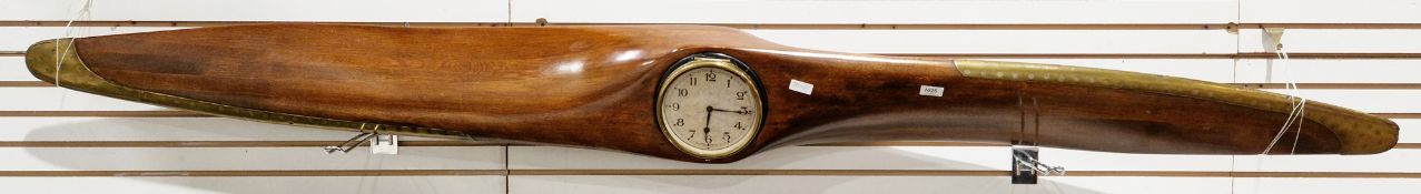 Air ministry mahogany aircraft propeller blade with brass tips, inset to the centre with a clock