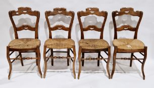 Set of four French Provincial ash dining chairs with shaped top and back rails, with rush seats,