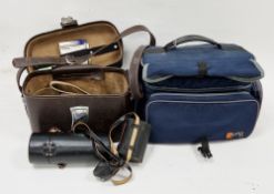 Canon AE-1 film camera, a light meter, a Ricoh FF*70 film camera, a Manfrotto Gimbal, various camera