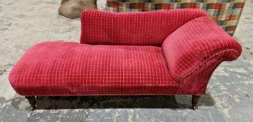 19th century chaise longue with a swept back rest and scrolling arm, upholstered in a square red