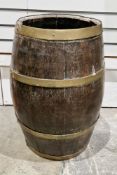 19th century brass-bound oak coopered barrel-shaped stickstand, applied with four riveted brass