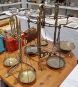 Set of late 19th / early 20th century brass balance scales by W & T Avery Ltd on three splayed feet,