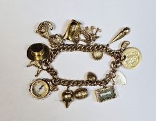 Early 20th century 9ct gold charm bracelet with various gold charms including Edward VII full