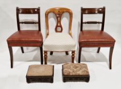 Pair of Anglo-Indian hardwood footstools, each with upholstered seats and ornate foliate carved