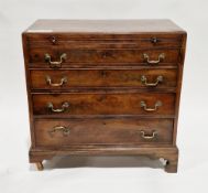 George III mahogany and cross-banded bachelor's chest of drawers with a cockbeaded brushing slide