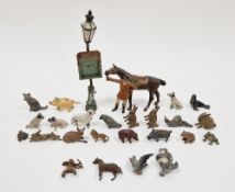 Collection of approximately 26 early 20th century painted lead figures and animals including
