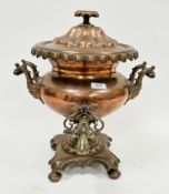 Victorian copper and brass samovar of globular form with turned wooden handles and a platform base