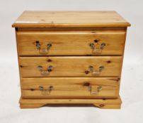 Two modern pine chest of drawers, each with three drawers having brass drop loop handles, one