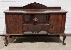 Large Victorian mahogany sideboard with moulded arched backrail, the top with foliate carved edge,