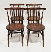 Set of four Victorian Penny Seat kitchen chairs with spindle backs and raised on turned ringed legs,