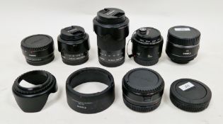 Four Canon camera lenses - RF50mm F1.8 STM, 15045 image stabilizer with EW-53 hood, EF 50mm 1:1.8 II