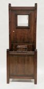 1930's/40's oak hallstand with mirrored back, six coat hooks, glove drawer and stickstands with